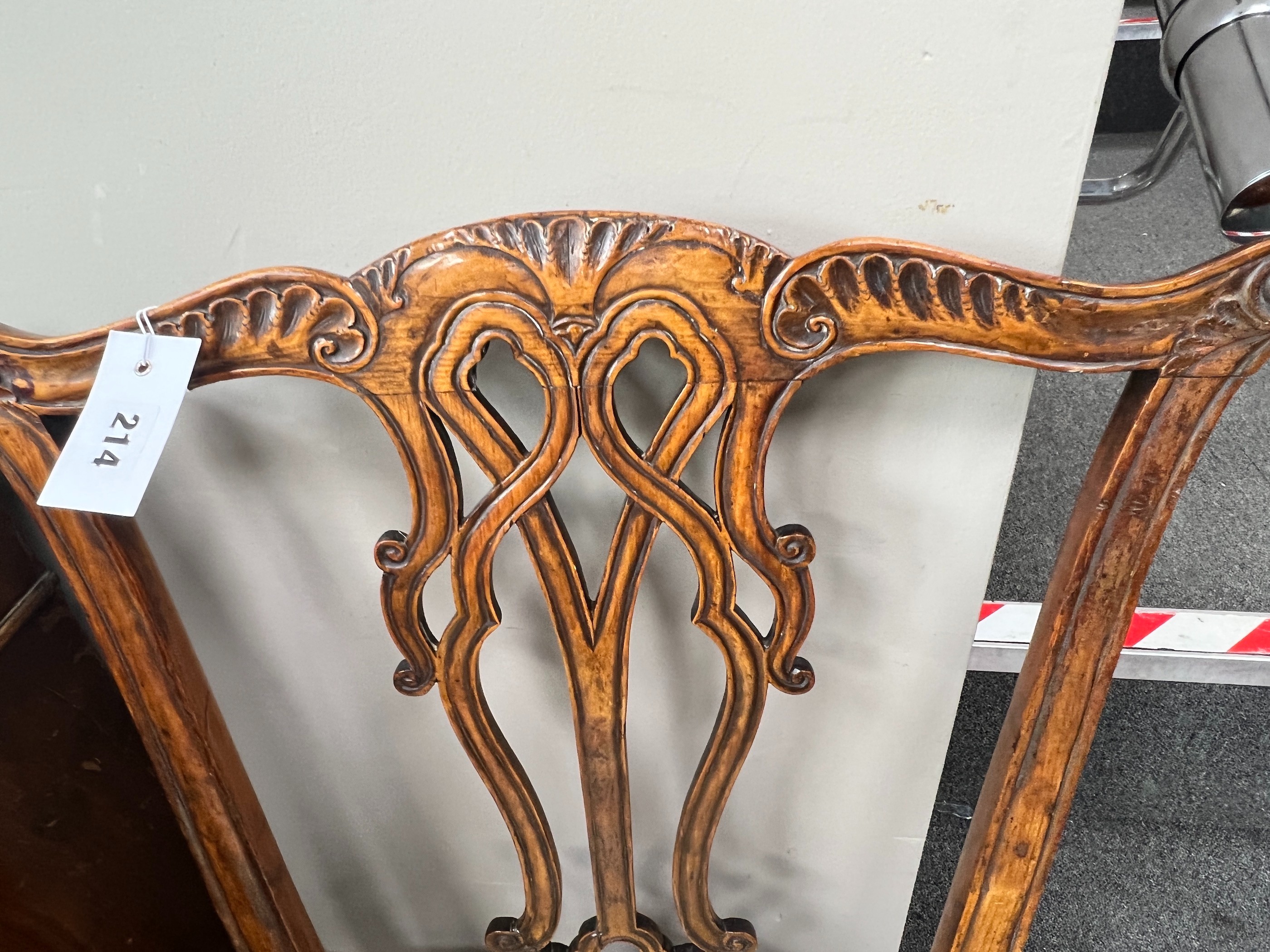 A pair of George III carved mahogany dining chairs